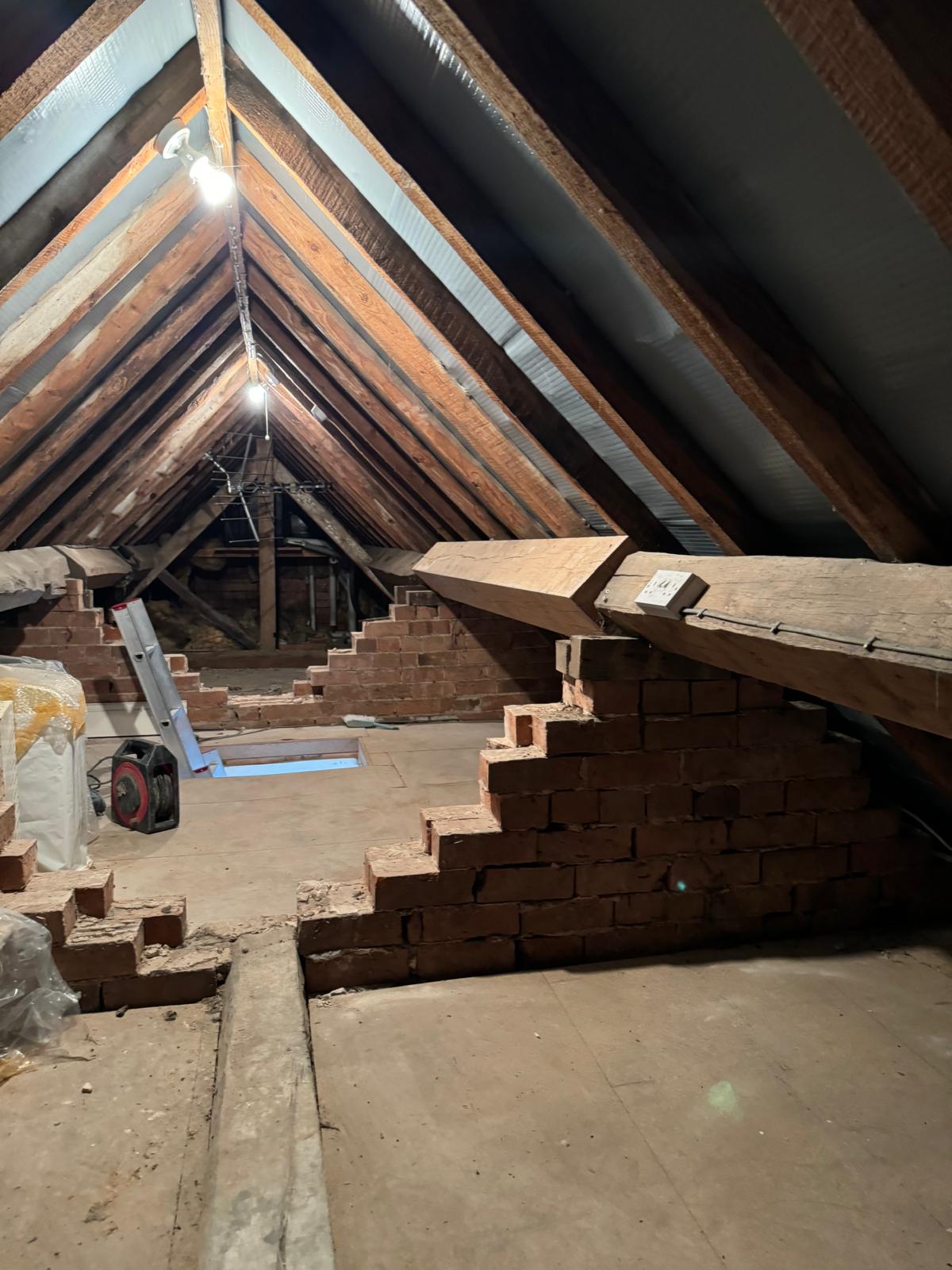 Traditional brickwork restoration in attic space