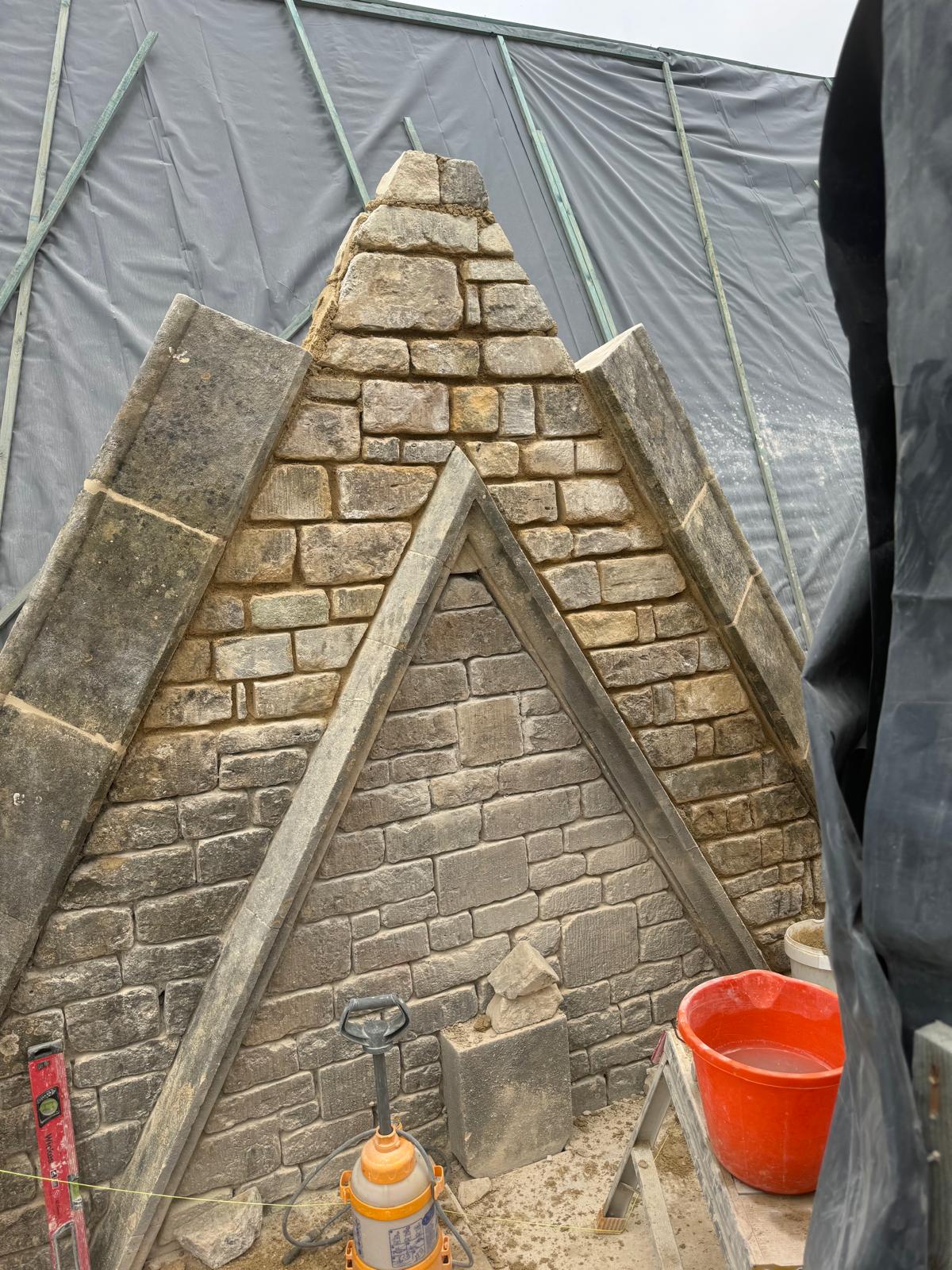 Heritage chimney restoration with traditional stonework