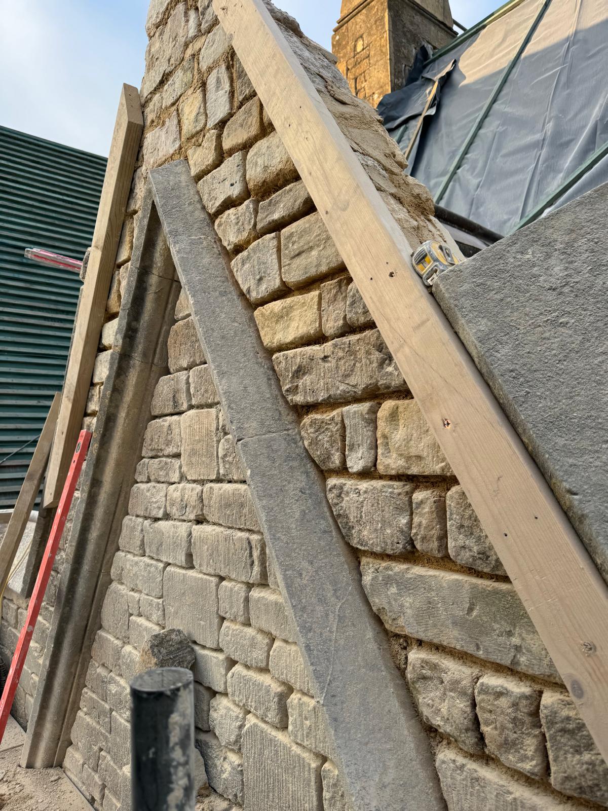 Traditional stone roof restoration with lime mortar